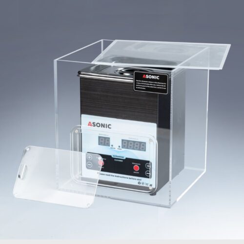 Öppen ljuddämpad låda med en 2 liters ASONIC ultraljudsrengörare inuti, utformad för att minska bullret under drift.
