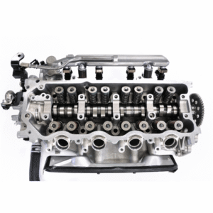 Stor bilmotor delvis exponerad för att visa komponenter som kan rengöras med ultraljudsteknik.